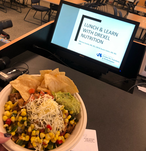 Photo of Mexican meal bowl and computer screen